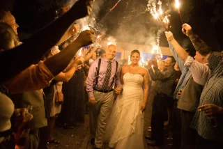 Bride and groom sparkler exit